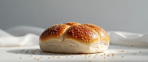 Freshly Baked Sesame Seed Bun with Golden Brown Color and Soft Texture photo