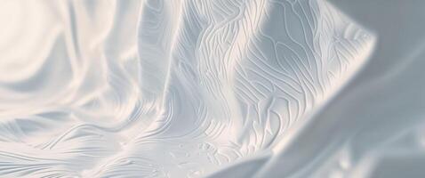 A white fabric with waves and ripples photo