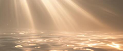 Sunbeams shining through water on a surface photo