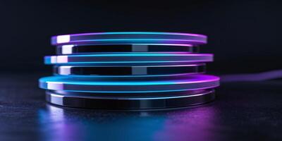 Neon glowing stack of futuristic data discs on dark background photo