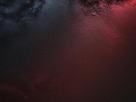 Dark red background textured surface texture appears to gradient. photo