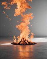 Fire burning above empty concrete floor background. photo
