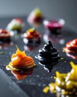A black table with several different types of food photo