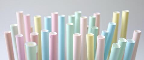 Array of Colorful Diagonal Straws in Pastel Shades Creating an Aesthetic and Playful Background. photo
