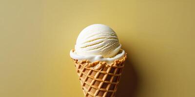 Vanilla Ice Cream in Waffle Cone on Yellow Background. photo