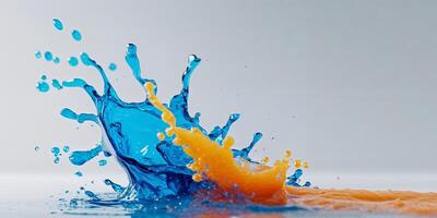 Orange and blue splash of liquid on white background photo