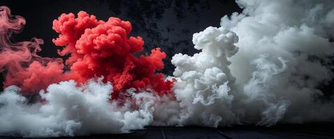 Dramatic contrast of red and white smoke on black background for dynamic visual design. photo