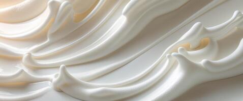 A close up of a white cream with swirls photo