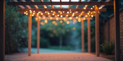 A Lit Pergola Structure Decorated with String Lights at Dusk. photo