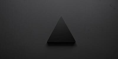 A black background with a black triangle on it. photo