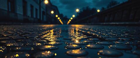 Wet Cobblestone Street at Night with Reflections and Street Lights. photo