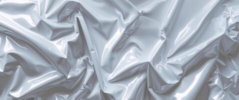 Shiny crumpled plastic texture for creative background and design. photo