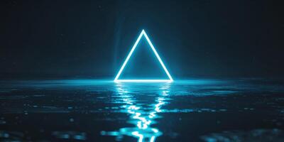 A neon triangle in the water with a reflection photo