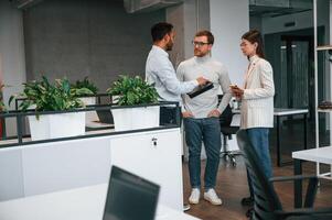 Financial, questions. Couple are in the office, getting consulted by a manager photo