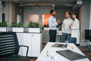 Financial questions. Couple ,are, in the office, getting consulted by a manager photo