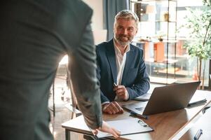 .Business people are working together in the office photo