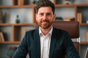Portrait of businessman in formal, clothes that is working indoors photo