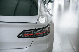 Close up view of the rear part ,of, the modern white car photo
