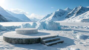 A serene arctic landscape featuring a round platform and steps on a snow covered ground, with majestic mountains and clear blue skies in the background. photo