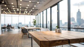 Modern office with wooden tables, large windows overlooking cityscape, and a warm, inviting atmosphere perfect for collaboration and productivity. photo