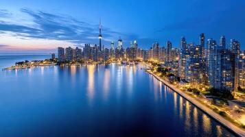 stunning city skyline at twilight with reflections on water photo