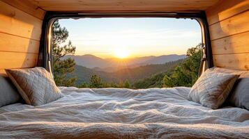 cozy van interior with stunning sunrise view over mountains, perfect for travelers photo