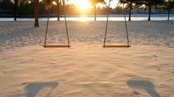 Sunset over sandy playground with swings casting long shadows photo