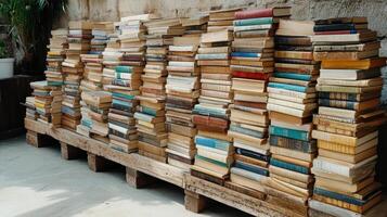 cozy bookstore filled with stacked books on wooden pallets, inviting exploration photo