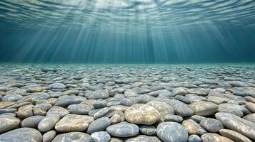 serene underwater view of riverbed with sunlight filtering through photo