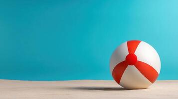 colorful beach ball on bright turquoise background evokes summer fun photo