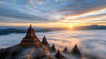 foggy sunrise over ancient temples, creating serene atmosphere photo