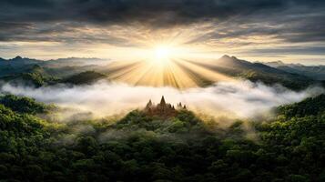 breathtaking sunrise over ancient temple surrounded by lush greenery and mist photo