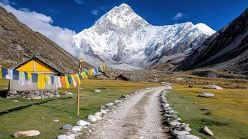 scenic Tibetan style village with colorful prayer flags and mountains photo
