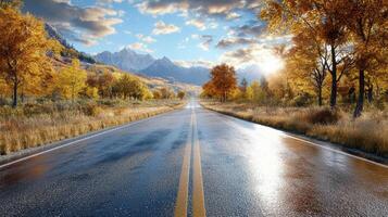 peaceful countryside road lined with autumn trees and mountains photo