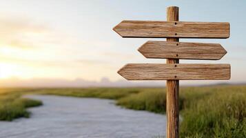 Rustic wooden road sign at crossroads in serene landscape photo