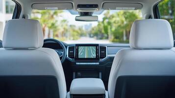 modern car interior featuring digital screen and spacious seating photo