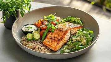 healthy meal featuring grilled salmon, quinoa, and roasted vegetables photo
