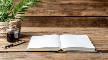 open notebook with quill and ink bottle on wooden table photo