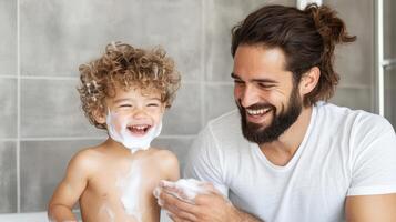joyful father and son enjoying bath time with soap bubbles photo
