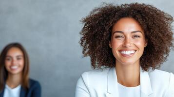 Empowered women smiling during mentorship session, showcasing confidence and success photo