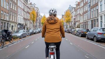 Exploring Amsterdam hidden alleys on bicycle, surrounded by autumn colors photo
