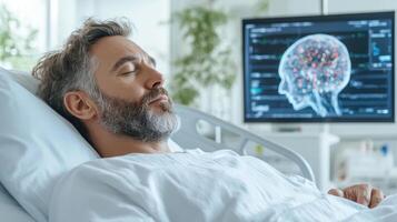 Patient resting in hospital room with brain scan display behind photo