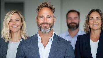 Professional group of diverse business leaders smiling confidently together photo