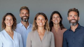 Diverse group of professionals smiling together in modern setting photo