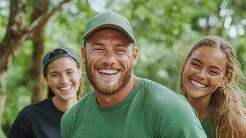 Happy coworkers enjoying time outdoors, laughing together in nature photo