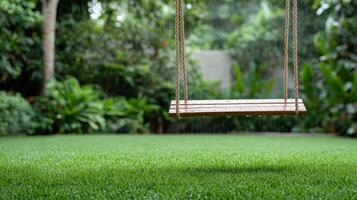quiet backyard after rain shower, featuring single empty swing photo
