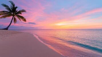 stunning pink and orange sky over tropical beach at sunset photo