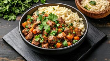 delicious bowl of Moroccan lamb stew served with couscous, garnished with fresh herbs photo
