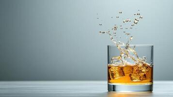 refreshing glass of whiskey with ice splashes, creating dynamic scene of liquid motion photo