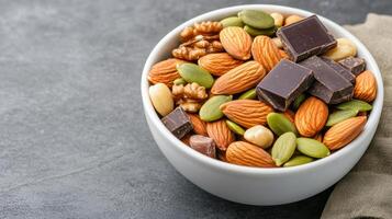 heart healthy bowl filled with nuts, seeds, and dark chocolate offers nutritious snack photo